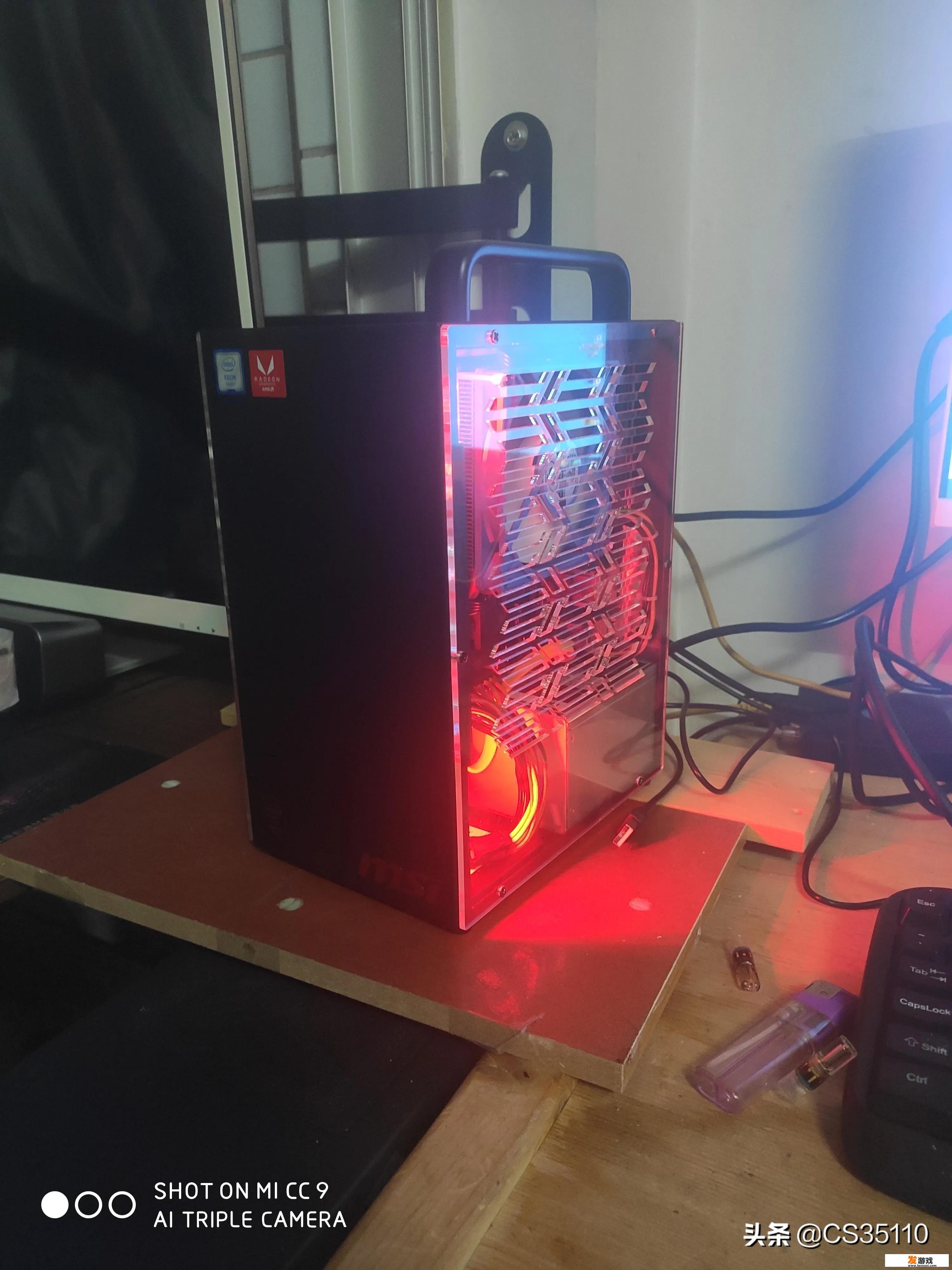 预算5000,组装一台便携出行小机箱电脑，能畅玩大部分热门游戏，连接无线网，求大佬给个配置
